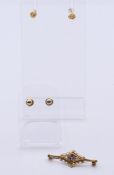 A 9 ct gold diamond and amethyst brooch and two pairs of ear studs. The former 3.5 cm wide.