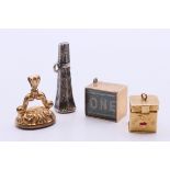 Three 9 ct gold charms to include: a 'first aid' box,