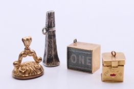 Three 9 ct gold charms to include: a 'first aid' box,