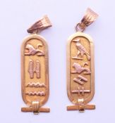 Two gold pendants decorated with Egyptian hieroglyphs. Each 3 cm high. 4 grammes.