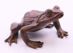 A bronze frog. 5 cm long.