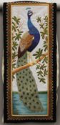 A 20th century embroidery of a peacock. 162 x 68 cm.