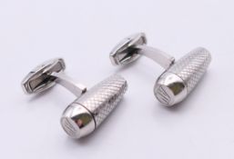 A pair of stamped Audemars Piguet cufflinks in a Penrose of London box. 2.5 cm wide.