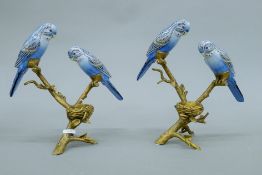 A pair of porcelain and gilt metal bird candlesticks. 25 cm high.