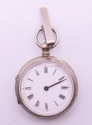 A pocket watch with open face and back. 4.5 cm diameter.