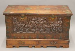 A late 19th/early 20th century brass inlaid Indian chest on stand. 115 cm wide.