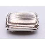 A 19th century silver-plated reeded decorated snuff box with gilded interior. 4 x 5.5 cm.