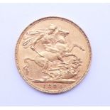 An 1894 gold sovereign. 8 grammes.