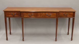 A pair of reproduction serving tables. Each 183 cm wide, 84 cm high, 51 cm deep.