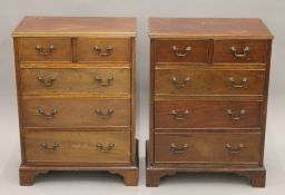 A pair of early 20th century small mahogany chests of drawers. Each 54.5 cm wide.