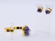 A suite of Contemporary Designer jewellery set with amethyst and quartz crystals, the bangle 7.