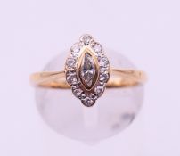 A 9 ct gold and diamond cluster ring. Ring size N.