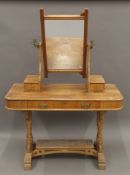 A Victorian satin walnut dressing table. 113 cm wide.