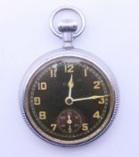 A black dial pocket watch. 5 cm diameter.