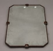 An early 20th century oak-framed mirror. 77 x 50 cm.