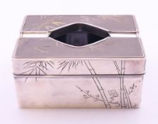 A Japanese silver and mixed metal ash tray. 10 cm long.