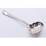 An Edwardian silver sifting spoon, hallmarked for Sheffield, 1902. 14.75 cm high.