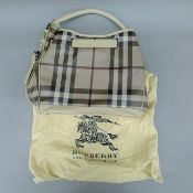 A Burberry beige smoked check PVC and leather Walden Hobo Trench bag with dust bag. 40 cm wide.