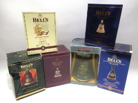 Five Bell's Scotch Whisky ceramic decanters, 70cl, and one 75cl, sealed and boxed (6)