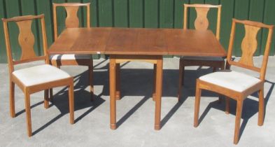 Albert Owlman Harrison of Thirsk - an oak rectangular drop leaf dining table, on square supports,