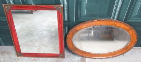 Red painted faux tortoiseshell framed wall mirror with pressed brass corners and a 1930's oak framed