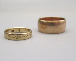 9ct rose gold wedding band, stamped 375, size Q1/2, 6.9g, and a 14ct yellow gold band with