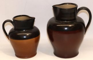 Two brown glaze stoneware jugs, one marked 3Pt. H25cm max (2)