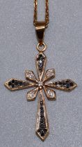 yellow metal cross pendant set with brilliant cut diamonds and sapphires, on 18ct yellow gold chain,