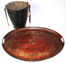 C19th oval toleware tray, L60cm; and a C19th studded leather fire bucket, H28cm (2)