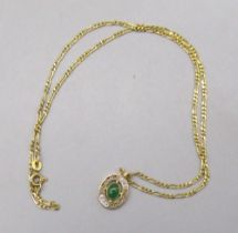 14k yellow gold oval pendant set with cabochon emerald and diamonds, stamped 14k, on 14ct yellow