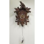C20th pine and walnut Black Forest cuckoo clock, Roman dial with applied indices, unsigned two train