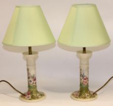 Moorcroft Pottery: pair of Spring Blossom pattern candlestick form table lamps, tube lined