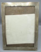 Geo.V engine turned silver easel photograph frame, oak back, hallmarked Birmingham 1919, 25.6cm x