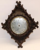 J. Brown, 76 St. Vincent St., Glasgow - early C20th oak aneroid barometer and thermometer, in carved