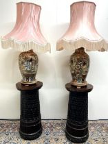 Pair of Satsuma style pottery baluster table lamps, decorated with figures, with watered silk