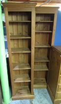 Pair of pine open bookcases, moulded cornice with five adjustable shelves on skirted base, W50cm