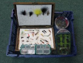 Collection of fishing flies in wooden box of various flies and nymphs