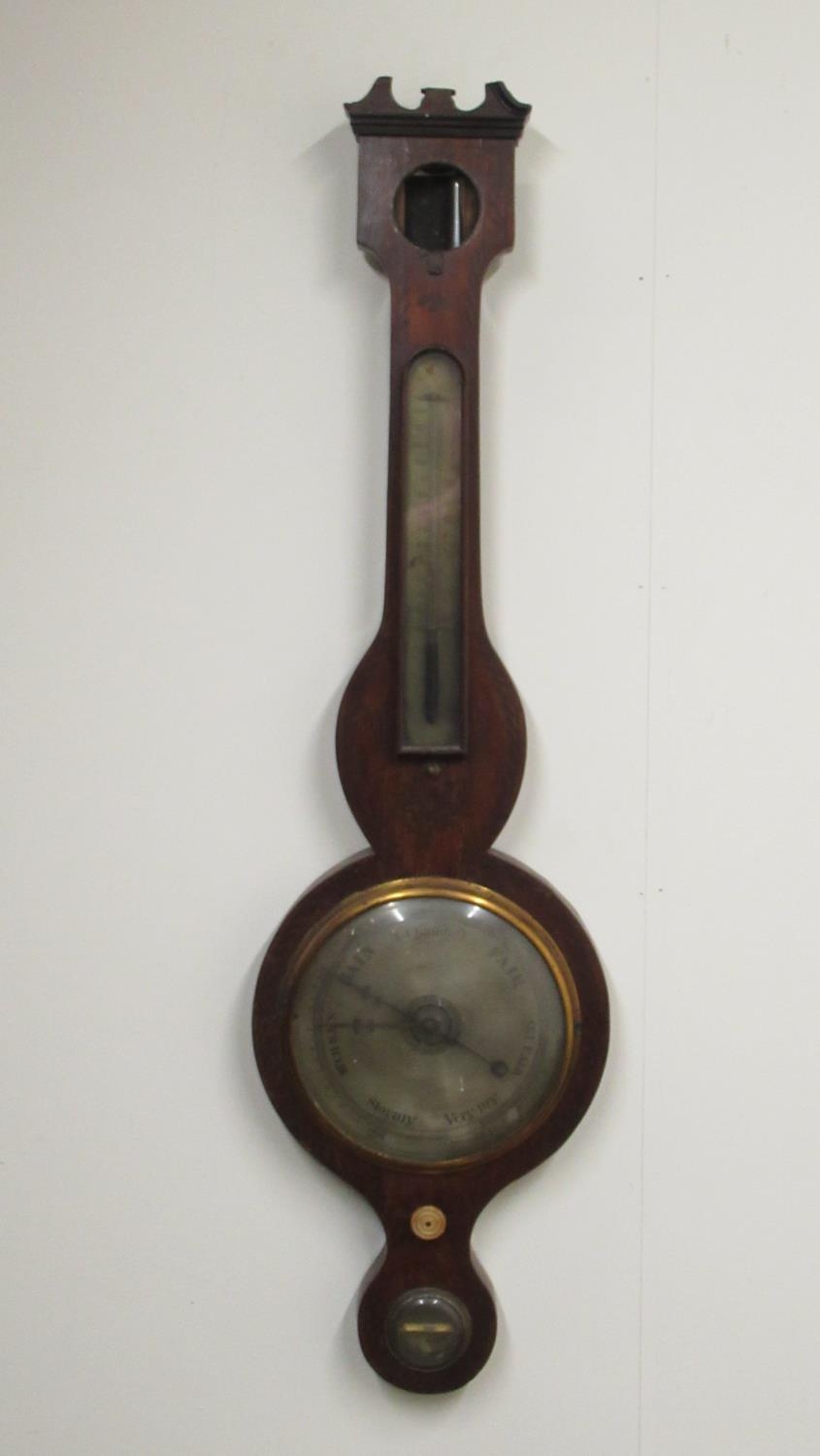 C19th mahogany wheel barometer with painted decoration, silvered dial, thermometer box and level. (