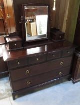 Stag Minstrel bedroom suite comprising; wardrobe W128cm, dressing table, low chest of drawers with