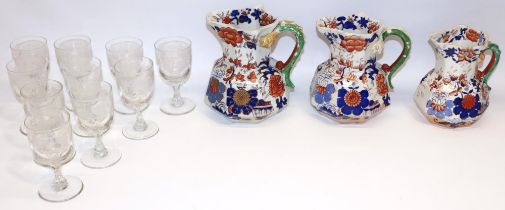 Set of three C19th graduated Masons Ironstone Hydra jugs, each with blue and burnt red Chinoiserie