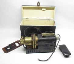 Early C20th brass and japanned magic lantern projector with original painted pine case L44cm (