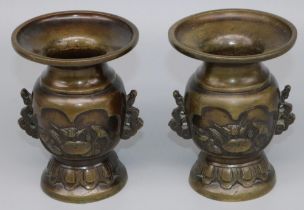 Pair of Japanese Meiji bronze two handled vases, bodies relief decorated with birds, H12cm (2)
