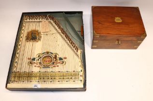 Satinwood writing box with fitted interior, L30cm; and an early C20th mandolin harp, made in Saxony,