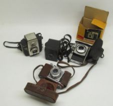 Lacon 35mm camera with 1:3.5 F=4.5mm lens no. 21349, Kodak Hawkeye Ace box camera, Kodak Brownie
