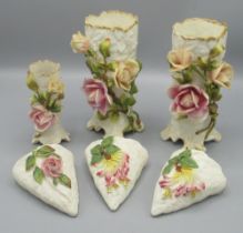 Three early C20th Robinson & Leadbeater wall mounted flower holders and 3 ceramic flower posy