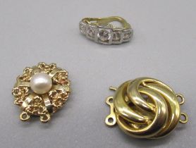 Three 9ct yellow gold clasps, one set with clear stones and another set with a single pearl, all