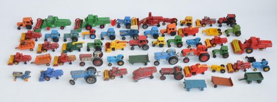 Collection of used small scale diecast tractors and other farm related machinery, mostly Lesney