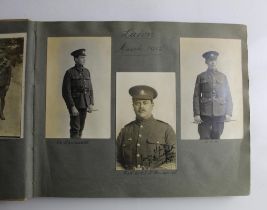 Album of photographs and magazine cuttings depicting military life during WWI, portraits of