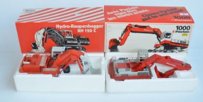 Two boxed 1/50 scale diecast hydraulic excavator models to include a CEF 1/50 scale diecast