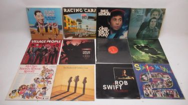 Assorted collection of vinyl LPs and 45 RPM's inc. Neil Diamond, Status Quo, Elton John, Jean Michel